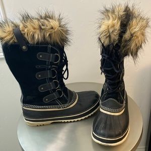 Sorel waterproof Joan of arctic lace up boots.